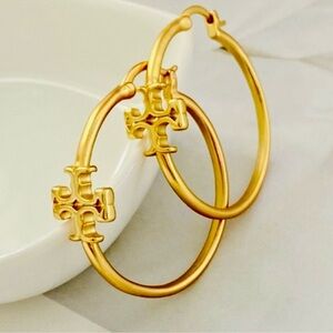 Tory Burch Gold Hoop Earrings with iconic logo. Matt finish. New.